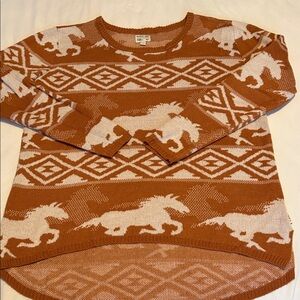 RVCA Buddy Knit Pullover Sweater featuring a wild horse artwork in amber color.